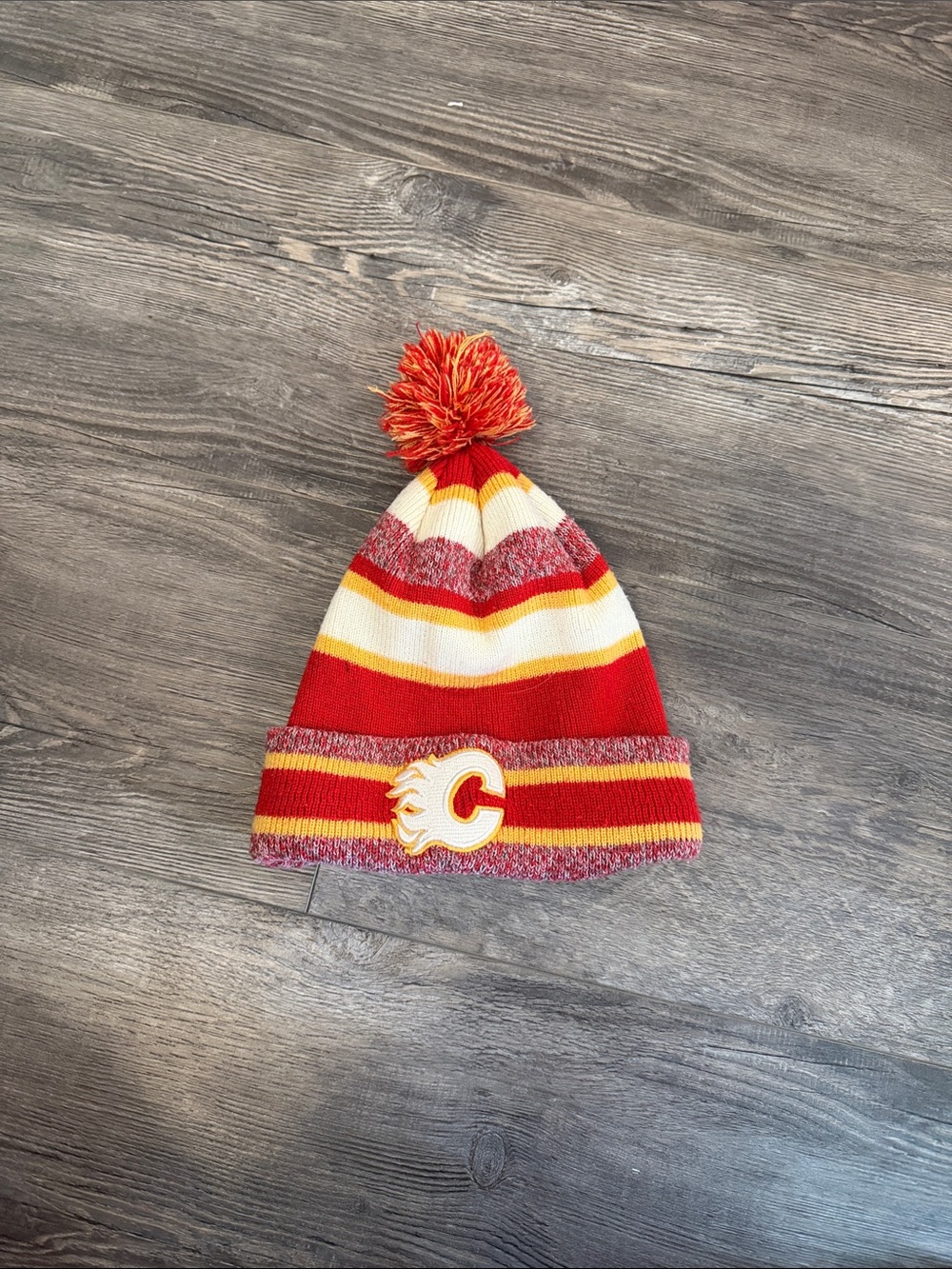 CCM Red, Yellow & White Pom Beanie with Calgary Flames Patch